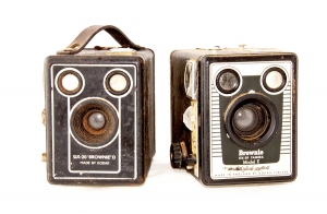 Two Vintage Cameras On White Background